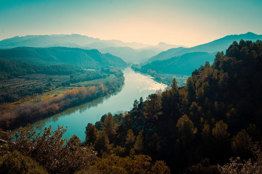 View of the Ebro river from the Miravet castle viewpoint, Tarragona  Ebro river meanders on a mild winter afternoon