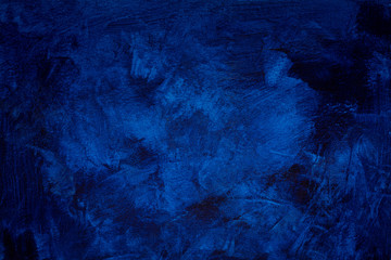 abstract dark blue grunge stucco wall backdrop