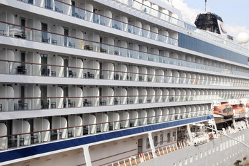 row of cruise ship passenger rooms.