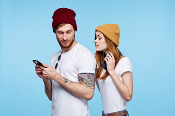 young couple in t-shirts chatting