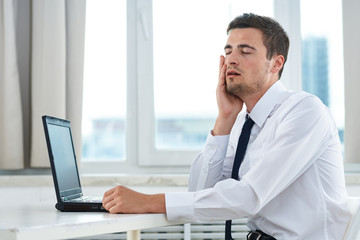 Fototapeta premium businessman working on laptop in office