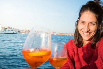 Girl drinking spritz aperitivo in Venice