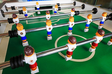 Fototapeta premium dolls of a retro foosball table to play table football