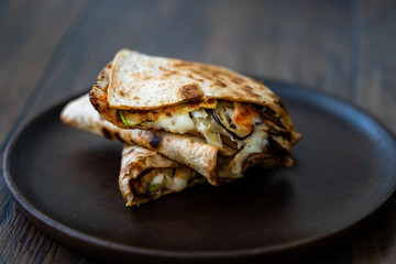 Veggie Italian Closed Calzone Pizza Slices with Mushrooms.