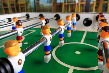 Fototapeta premium dolls of a retro foosball table to play table football