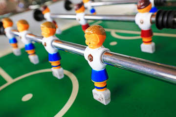 Fototapeta premium dolls of a retro foosball table to play table football