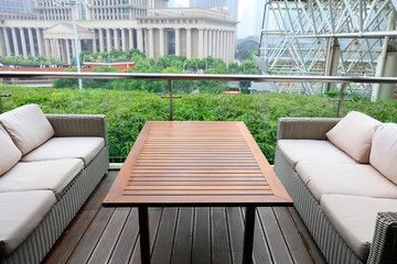 The table and sofa are in the hotel.
