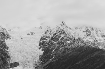 Black and white shot of Mountain landscape. Mount Tetnuldi and glacier Lardaad. Ushguli, Svaneti, Georgia