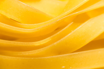 Macrophotography of pasta. Wide pasta close, tangled tangle, closeup of food