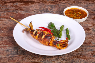 Grilled squid with sauce and hebs