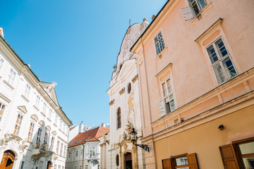 Fototapeta na wymiar Franciscan church and old town street in Bratislava, Slovakia