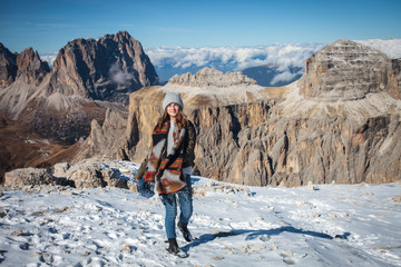 Young Beautiful Girl on Top of Alpine Mountains