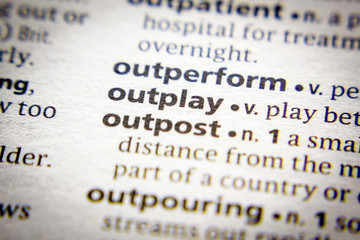 Obraz premium Word or phrase Outplay in a dictionary.