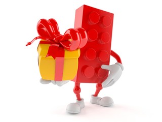 Toy block character holding gift