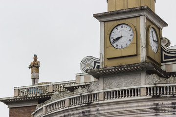 huge clock and statue on the tower of the mosque in Darjeeling