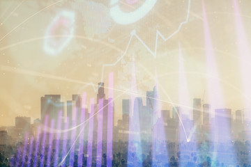 Forex chart on cityscape with skyscrapers wallpaper multi exposure. Financial research concept.