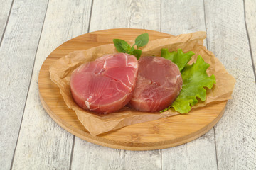Raw tuna round steak for grill