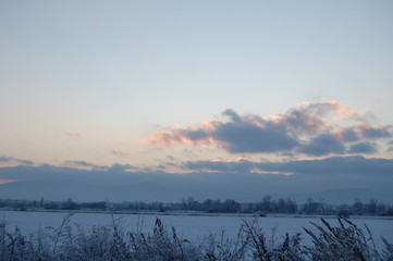 sunset in the frozen winter wonderland