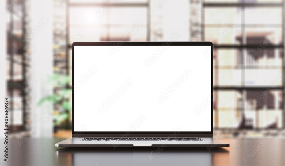 Wall mural laptop blank on the table in loft interior