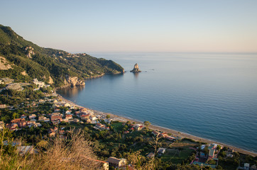 Agios Gordios village and beach on Corfu Island, at sunset