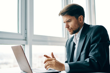 Fototapeta premium businessman working on laptop in office
