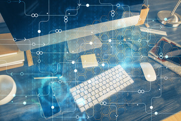 Technology theme drawing and table with computer. Double exposure. Concept of information.
