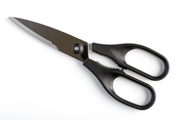 The closed scissors on a white background isolated