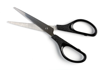 Scissors in the open on a white background, isolated