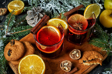 Mulled wine, a traditional Christmas hot drink on the table .