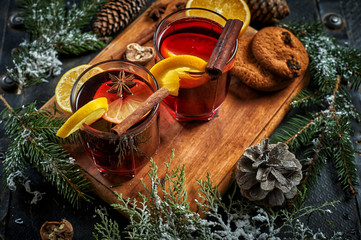 Mulled wine, a traditional Christmas hot drink on the table .