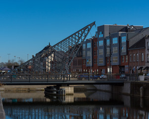 Dendermonde, Belgium - February 24: Vlasmarktbrug, a rocking triangle bridge over the Old Dender river