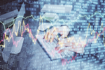 Double exposure of financial graph with man works in office on background. Concept of analysis.