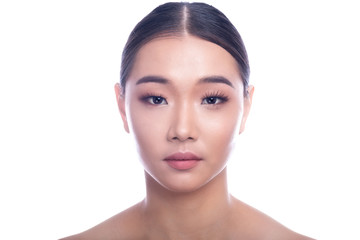 Obraz premium Beautiful Young Asian Woman with Clean Fresh Skin isolate on white background. Spa, Face care, Facial treatment, Beauty and Cosmetics concept. Portrait close up face.