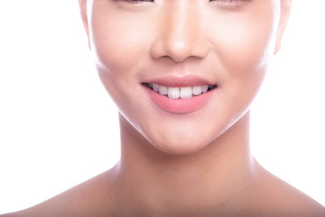 Obraz premium Beautiful Young Asian Woman with Clean Fresh Skin isolate on white background. Spa, Face care, Facial treatment, Beauty and Cosmetics concept. Close up mouth, smile.