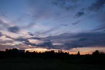 Fototapeta premium Dramatic sunset sky with clouds