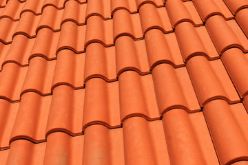 new red roof tiles closeup