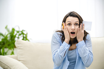 Oh no Portrait of surprised female with bugged eyes and widely opened mouth, feeling shocked. Cpy space. Close up.