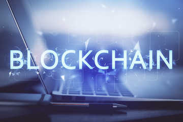 Multi exposure of blockchain theme hologram and table with computer background. Concept of bitcoin...