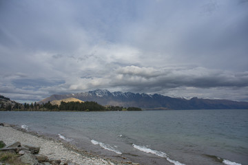 The Remarkables mountain view from Lake Wakatipu shore.