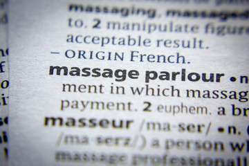 Obraz premium Word or phrase Massage parlour in a dictionary.