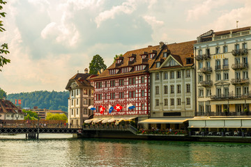 Reuss River and City of Lucerne with Luxury Hotel in Switzerland.