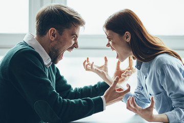 man and woman shaking hands