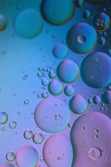 Oil drops in water. Abstract psychedelic pattern image multicolored. Abstract background with colorful gradient colors. Dof.