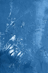 Canvas with oil paints blue color. Bright saturated abstract trendy background, space for text. The concept of a creative atmosphere, artistic events, education, etc.