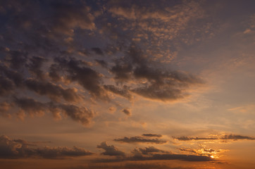 Fototapeta na wymiar Beautiful sunrise with cloudy sky over the mountains, soft focus, blur