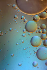 Oil drops in water. Abstract psychedelic pattern image multicolored. Abstract background with colorful gradient colors. Dof.