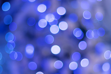 Lights on blue background. Christmas