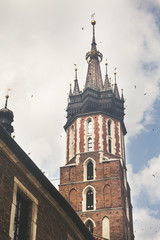 Fototapeta na wymiar Backside view of Saint Mary's Basilica, Brick Gothic church adjacent to the Main Market Square in Krakow, Poland from below