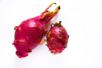 two dragon fruit on a white background, tropical fruit