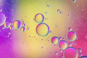 Oil drops in water. Abstract psychedelic pattern image multicolored. Abstract background with colorful gradient colors. DOF